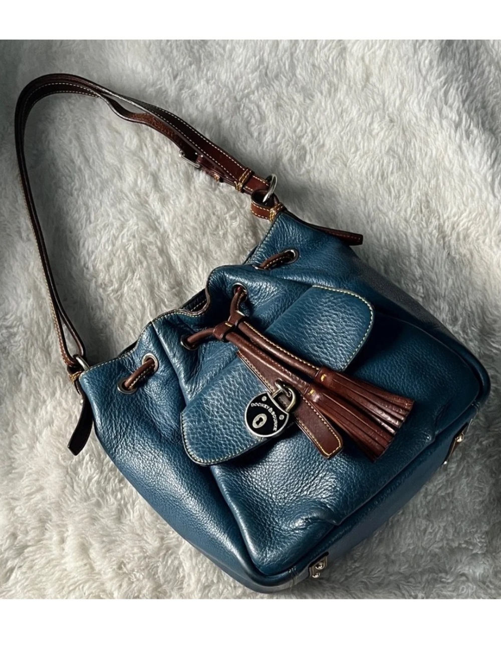 Dooney & Bourke Drawstring Bucket bag in teal with brown trim